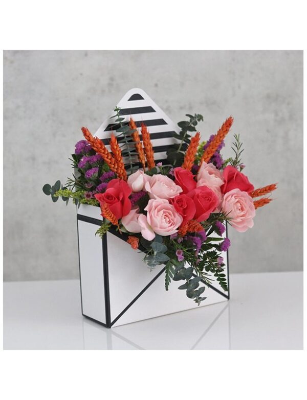 flowers in an envelope box