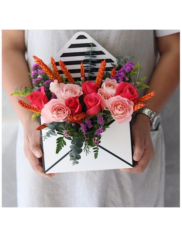 flowers in an envelope box