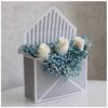 Envelope box containing gypsophelia and white roses for sale online by novo