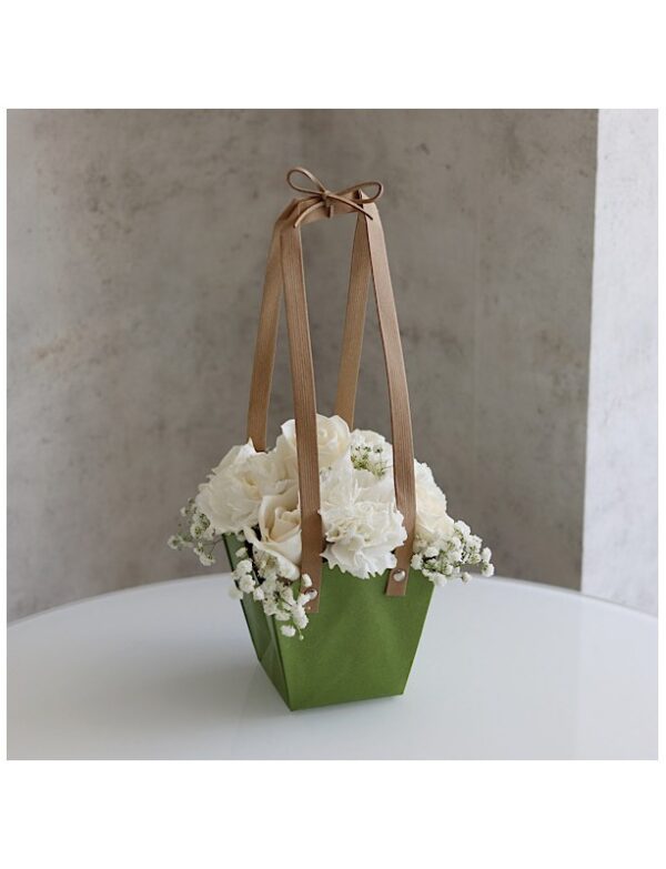 Green bag with white roses and carnations for sale online fresh flowers